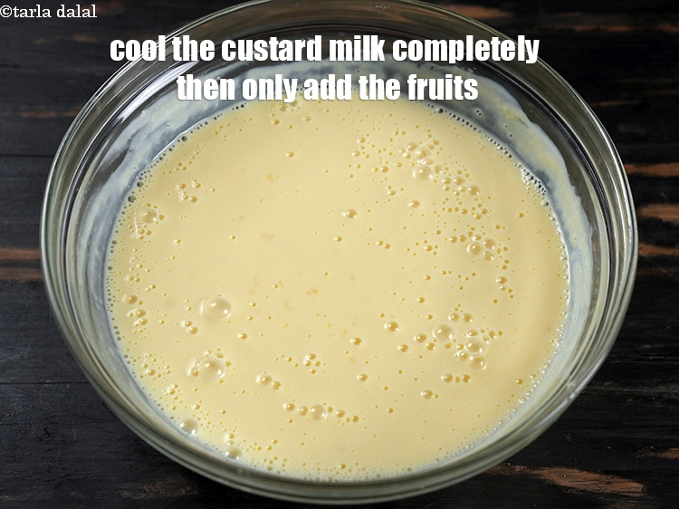 Step 23 – Cool the custard milk completely then only add the fruits.