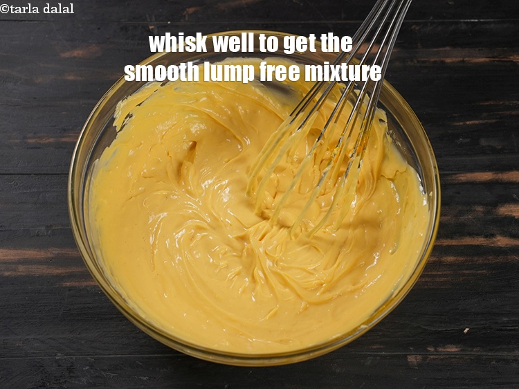 Step 18 – Whisk well to get the smooth lump free mixture.