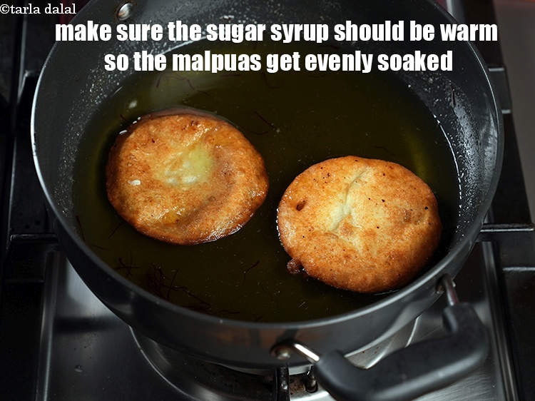 Step 31 – Make sure the sugar syrup should be warm so the malpuas get evenly soaked.
