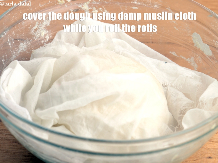 Step 18 – Cover the dough using damp muslin cloth while you roll the rotis.