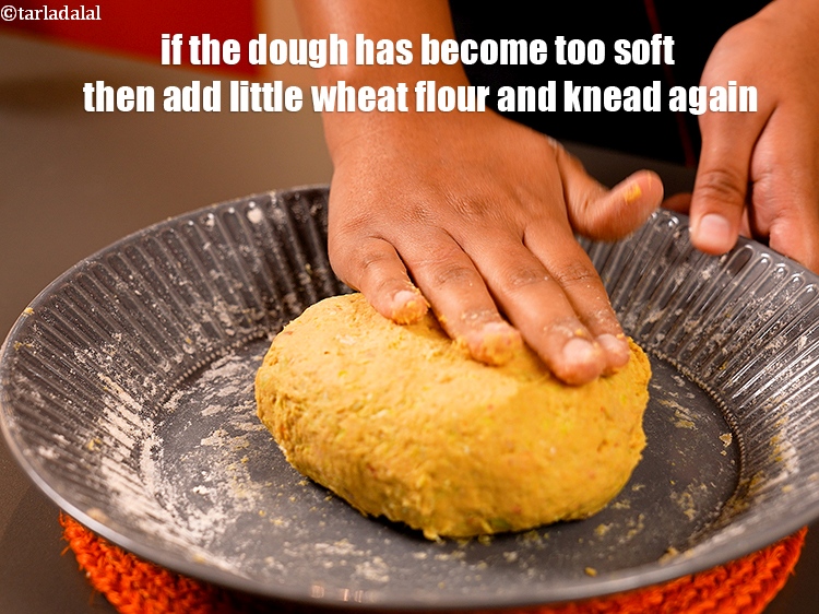 Step 23 – If the dough has become too soft then add little wheat flour and knead again.