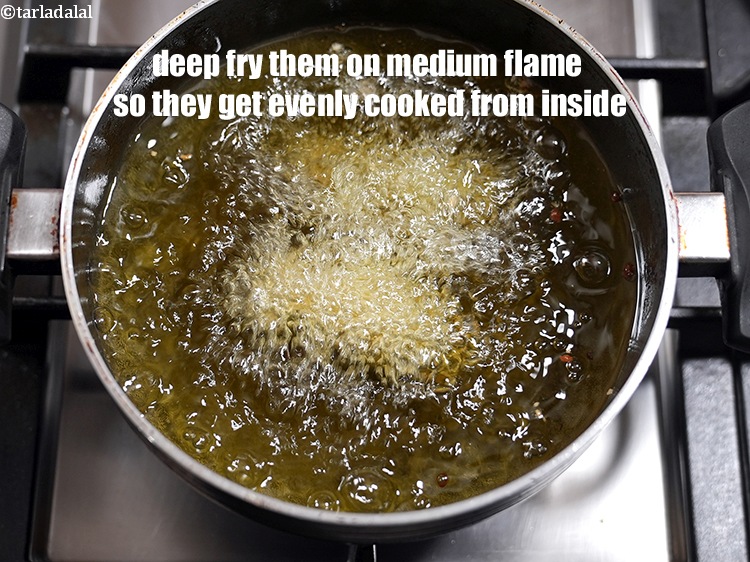 Step 27 – Deep fry them on medium flame so they get evenly cooked from inside.