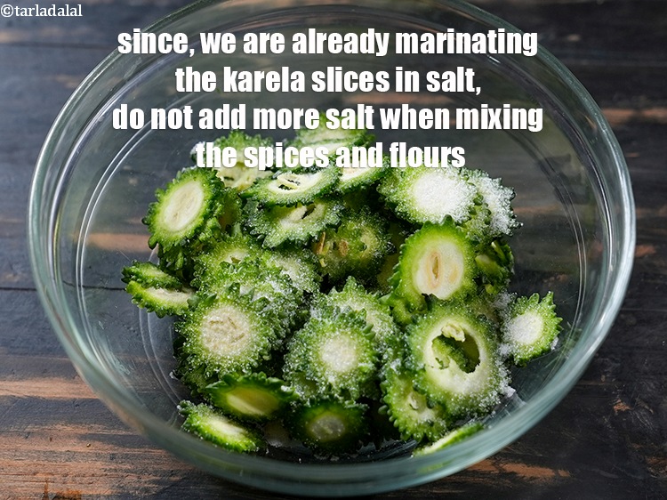 Step 24 – Since, we are already marinating the karela slices in salt, do not add more salt …