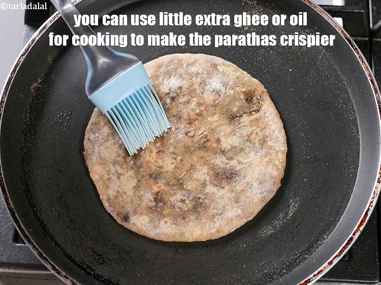 Step 35 – You can use little extra ghee or oil for cooking to make the parathas crispier.