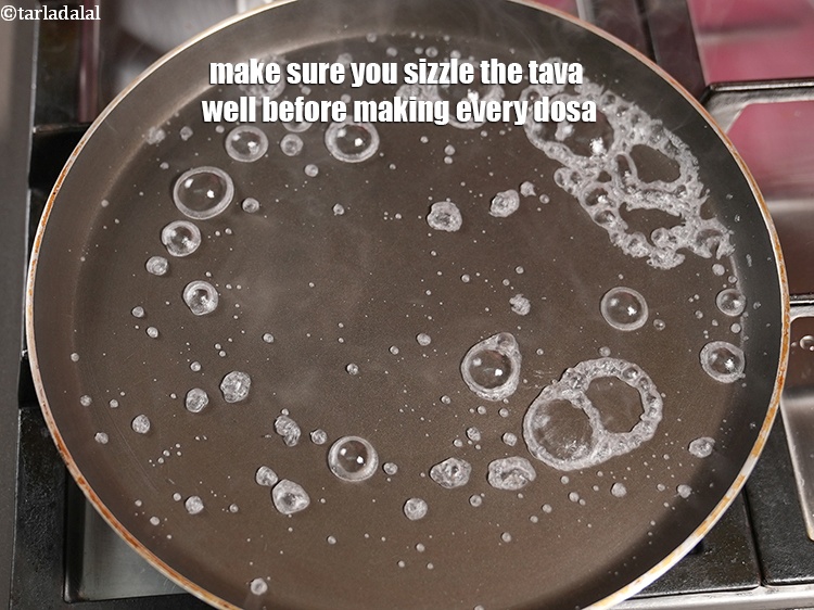 Step 47 – Make sure you sizzle the tava well before making every dosa.