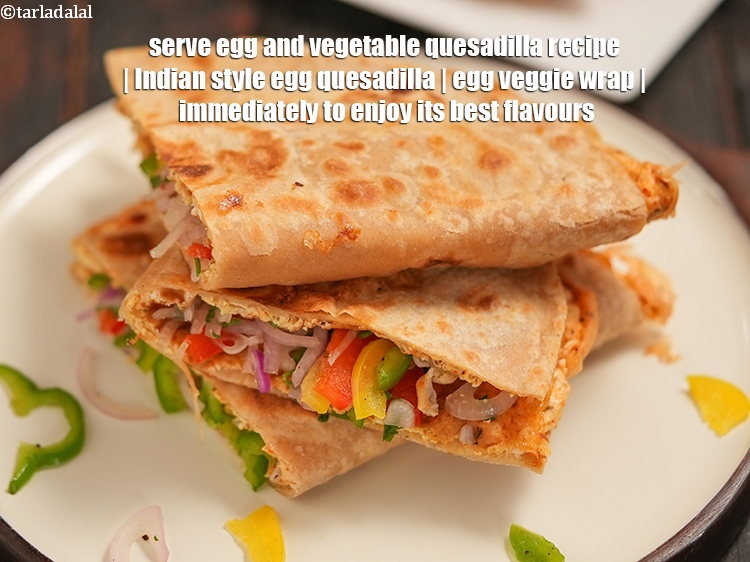 Step 28 – Serve <strong>egg and vegetable quesadilla recipe&nbsp;|&nbsp;Indian style egg quesadilla&nbsp;|&nbsp;egg veggie wrap&nbsp;|</strong> immediately to enjoy its …
