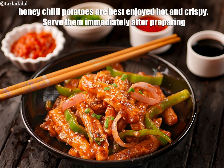 Step 55 – Honey chilli potatoes are best enjoyed hot and crispy. Serve them immediately after preparing.