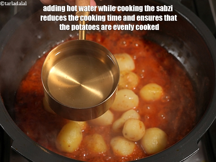 Step 36 – Adding hot water while cooking the sabzi reduces the cooking time and ensures that the …