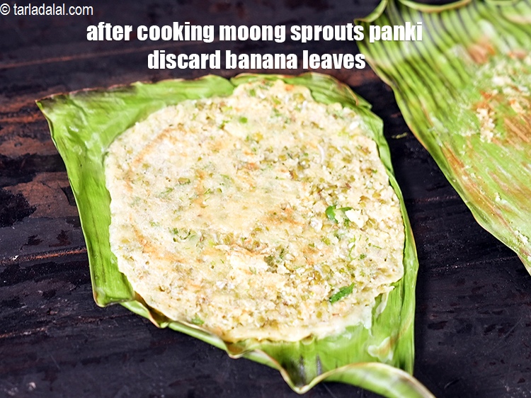Step 29 – <meta charset="UTF-8" />After cooking&nbsp;<strong>moong sprouts panki&nbsp;</strong>discard banana leaves.&nbsp;&nbsp;&nbsp;