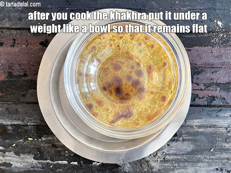 Step 42 – After you cook the khakhra, remember to put a weight on top of it like …