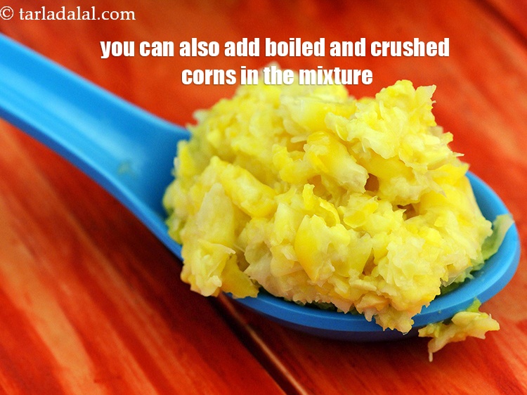 Step 35 – You can also add boiled and crushed corns in the mixture.