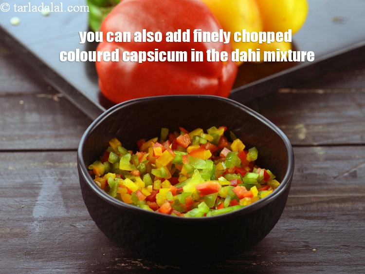Step 30 – You can also add finely chopped coloured capsicum in the dahi mixture.