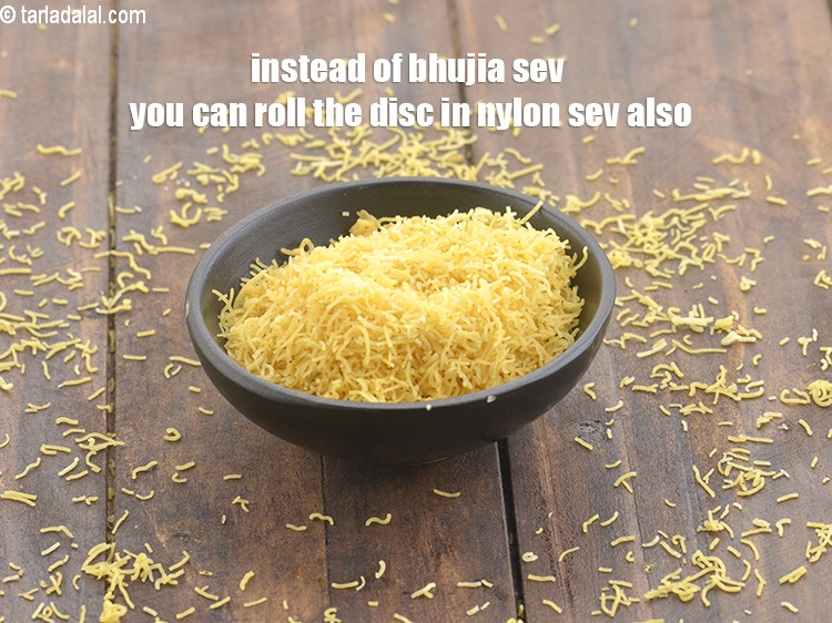 Step 21 – Instead of bhujia sev you can roll the disc in nylon sev also.