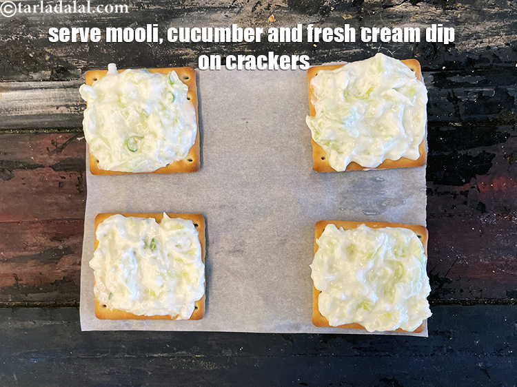 Step 18 – Serve <strong>mooli cucumber and fresh cream dip</strong> on crackers.&nbsp;