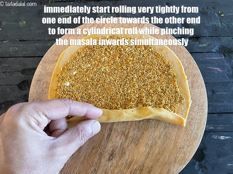 Step 60 – <meta charset="UTF-8" />Immediately start rolling very tightly from one end of the circle towards the …