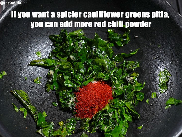 Step 25 – If you want a spicier <strong>cauliflower greens pitla</strong>, you can add more red chili powder.