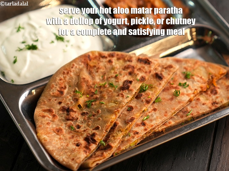 Step 34 – Serve your hot <strong>aloo matar paratha</strong> with a dollop of yogurt, pickle, or chutney for …