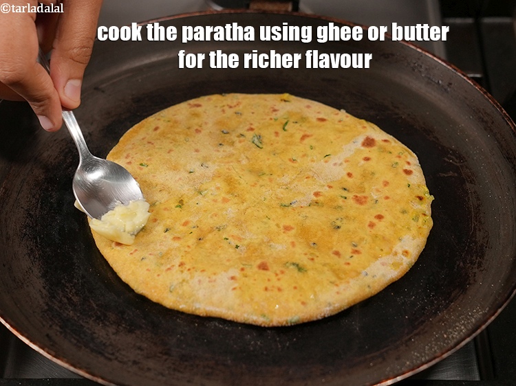 Step 35 – Cook the paratha using ghee or butter for the richer flavour.