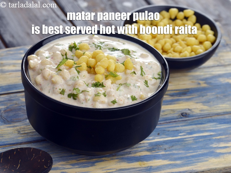 Step 44 – <strong>Matar paneer pulao</strong> is best served hot with <a href="https://www.tarladalal.com/boondi-raita-41081r" target="_blank">boondi raita</a>.