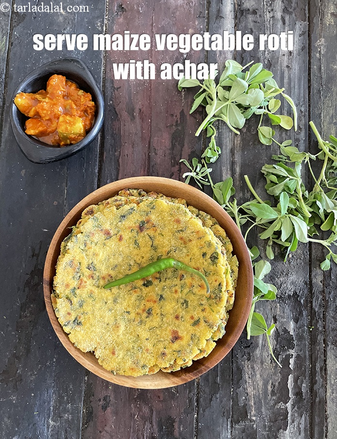 Step 31 – Serve&nbsp;<meta charset="UTF-8" /><strong>maize vegetable roti&nbsp;</strong>&nbsp;with achar.