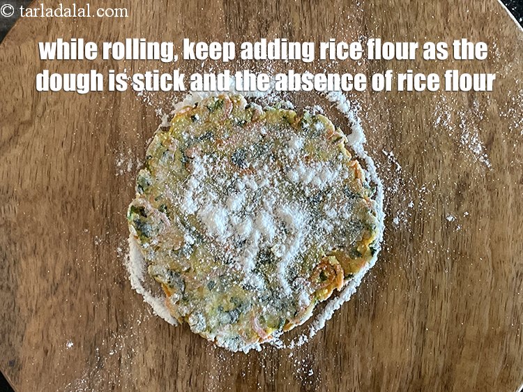 Step 29 – <p>While rolling the roti, add rice flour as the dough is sticky and difficult to …