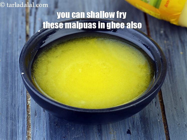 Step 32 – You can shallow fry these malpuas in ghee also.
