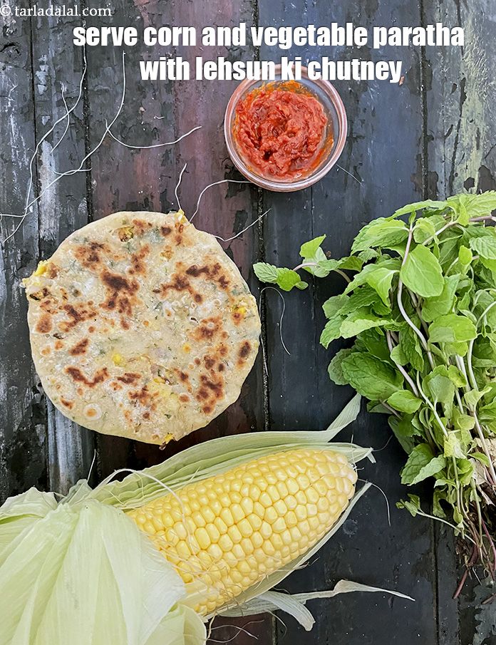 Step 64 – Serve&nbsp;corn and vegetable paratha with lehsun ki chutney.