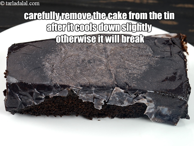 Step 22 – Carefully remove the cake from the tin after it cools down slightly otherwise it will …