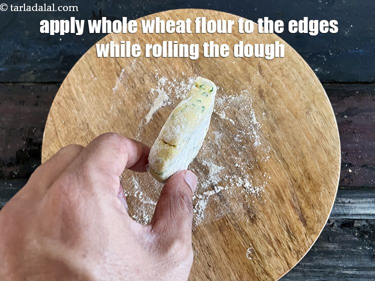 Step 29 – Apply whole wheat flour to the edges while rolling the dough.&nbsp;