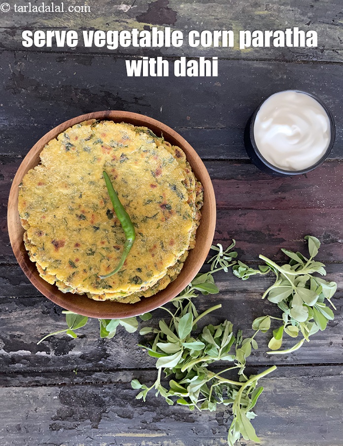 Step 33 – Serve corn vegetable paratha with dahi.&nbsp;See <a href="https://www.tarladalal.com/how-to-make-curd-or-dahi-at-home-2790r">how to make curds</a>.