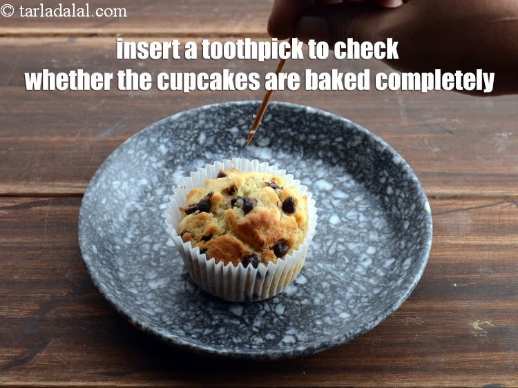Step 26 – Insert a toothpick to check whether the cupcakes are baked completely.