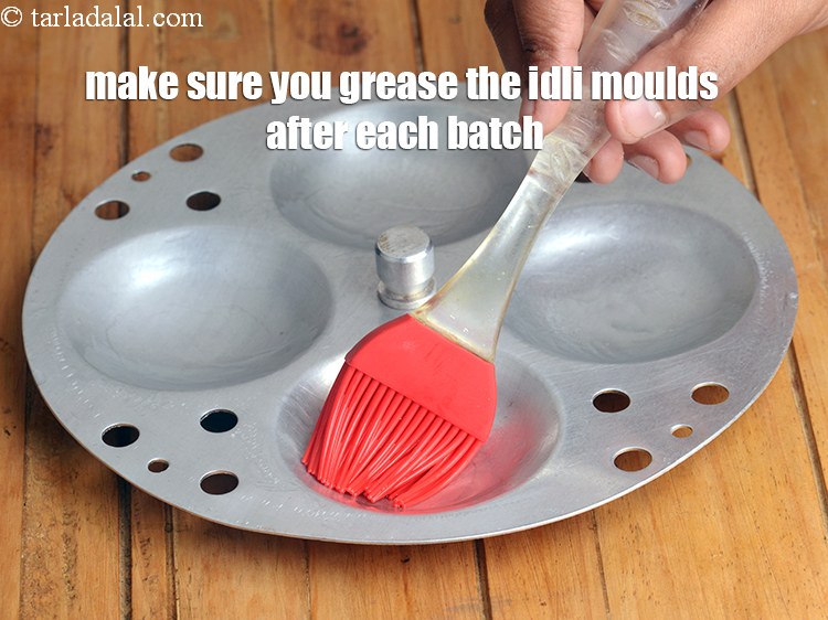 Step 22 – Make sure you grease the idli moulds after each batch.