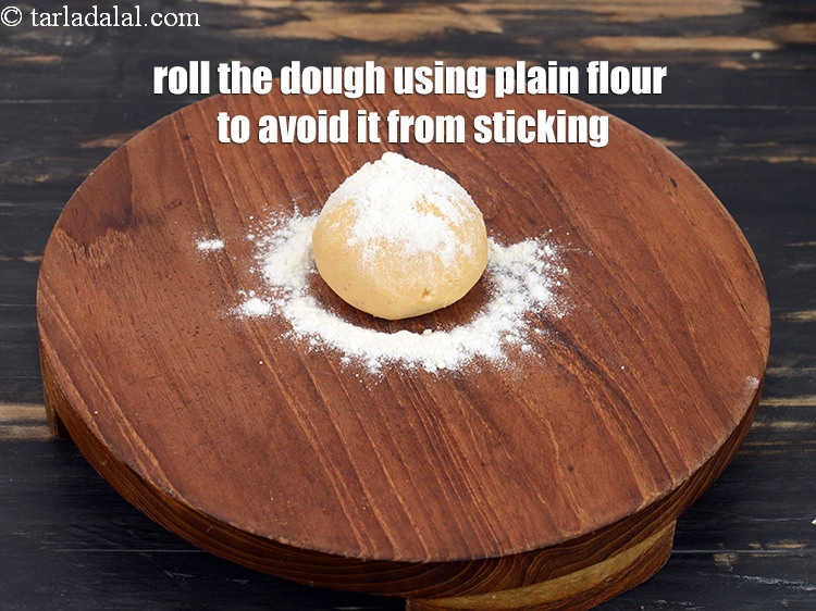 Step 22 – Roll the dough using plain flour to avoid it from sticking.