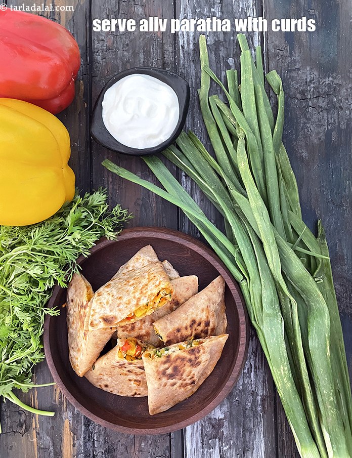 स्टेप 42 – कैल्शियम से भरपूर भोजन के लिए दही के साथ&nbsp;&nbsp;<strong>अलिव पराठा</strong>&nbsp;परोसें …