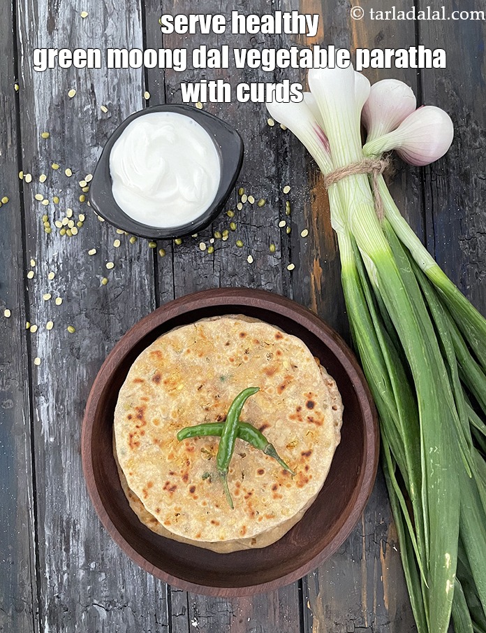 Step 45 – Serve&nbsp;<strong>healthy green moong dal vegetable paratha</strong> with curds. See <a href="https://www.tarladalal.com/how-to-make-curd-or-dahi-at-home-2790r">how to make dahi</a>.