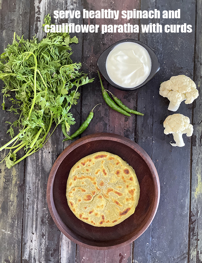 Step 44 – Serve<strong> healthy spinach and cauliflower paratha</strong> with curds. See <a href="https://www.tarladalal.com/how-to-make-curd-or-dahi-at-home-2790r">how to make dahi</a>.