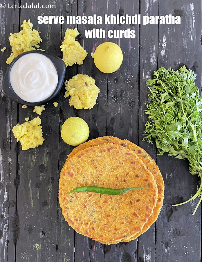 Step 30 – Serve&nbsp;masala khichdi paratha with curds.&nbsp;<meta charset="UTF-8" />See&nbsp;<a href="https://www.tarladalal.com/how-to-make-curd-or-dahi-at-home-2790r">how to make curds</a>.&nbsp;