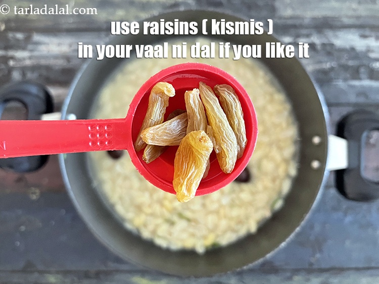 Step 37 – Some Gujaratis add&nbsp;<meta charset="UTF-8" />1 tbsp&nbsp;<a href="glossary-raisins-kishmish-kismis-597i">raisins (kismis)</a>&nbsp;while making vaal ni dal.