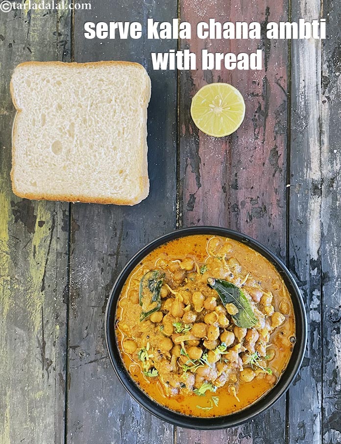 Step 53 – Maharshtrian&#39;s serve&nbsp;kala chana amti with bread.