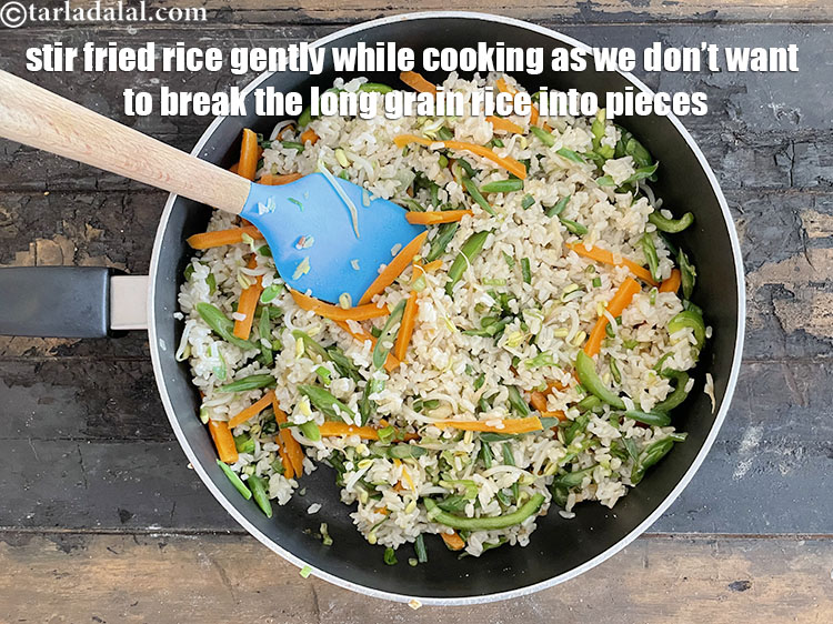 Step 23 – Stir fried rice gently while cooking it as we want the long grained rice (Basmati) …