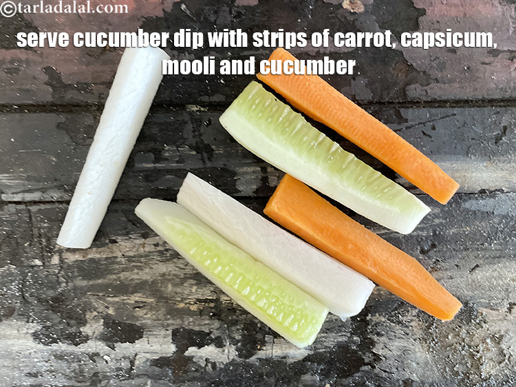 Step 18 – Serve <strong>cucumber dip</strong> with strips of carrtots, mooli, capsicum and cucumber.