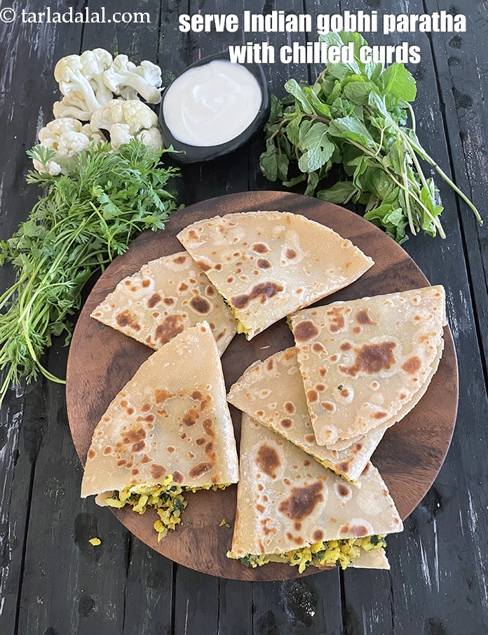 Step 43 – Serve&nbsp;<strong>Indian gobhi paratha </strong>with chilled curds.&nbsp;<meta charset="UTF-8" />See&nbsp;<a href="https://www.tarladalal.com/how-to-make-curd-or-dahi-at-home-2790r">how to make curds</a>.&nbsp;