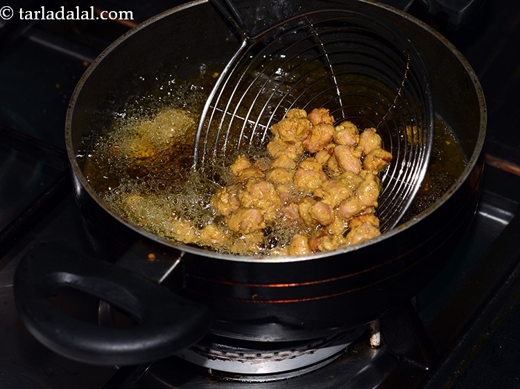 Step 22 – Do not fry all the peanuts together as they will stick and remain uncooked.