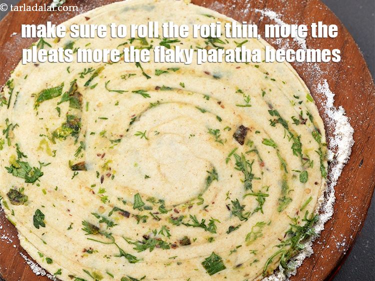 Step 36 – Make sure to roll the roti thin, more the pleats more the flaky paratha becomes.