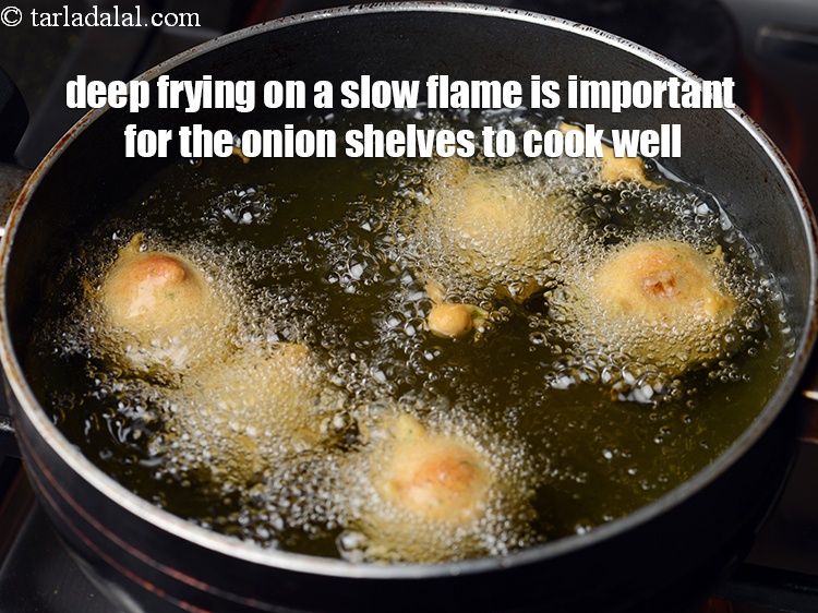 Step 40 – Deep frying on a slow flame is important for the onion shelves to cook well.&nbsp;