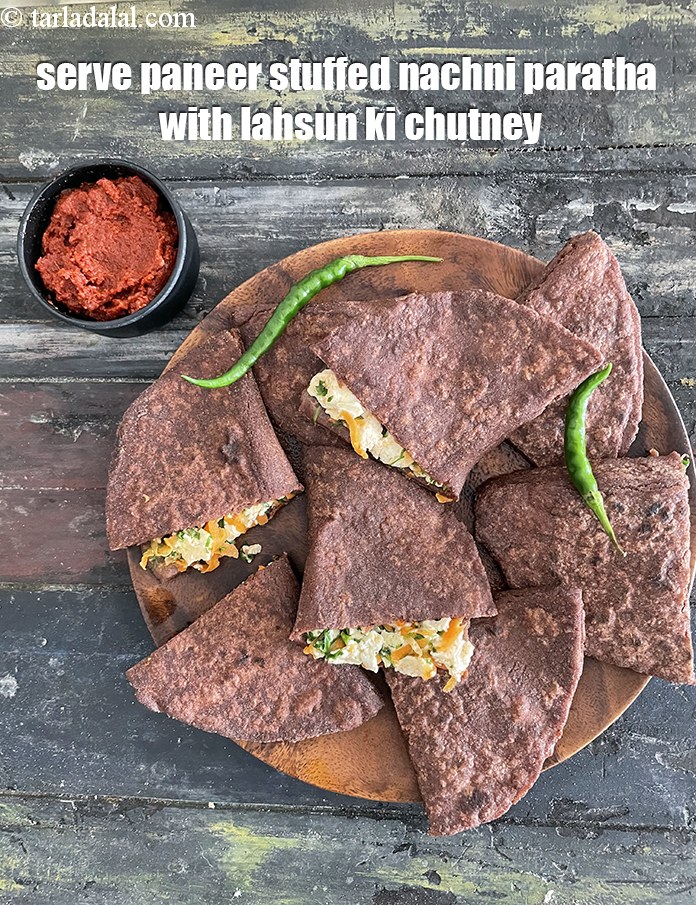 Step 30 – Serve with <strong>paneer stuffed nachni paratha&nbsp;</strong>lahsun ki chutney. See how to make <a href="https://www.tarladalal.com/lahsun-ki-chutney-lehsun-chutney-3902r"><strong>lahsun ki …