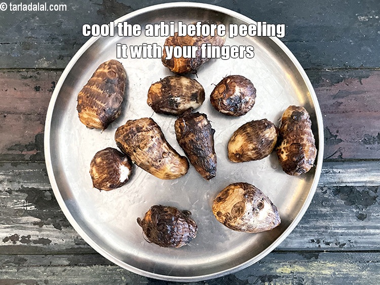 Step 28 – Cool the arbi before peeling it with your fingers.