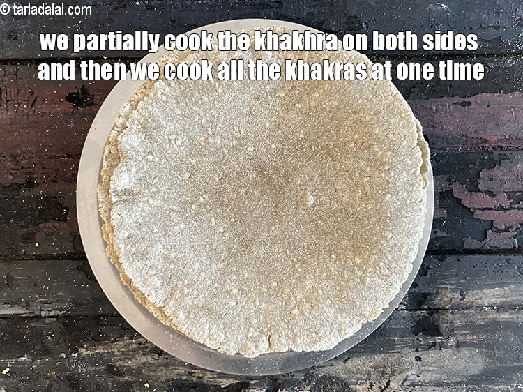 Step 24 – <meta charset="UTF-8" /> We first partially cook all the khakhara on both sides without oil …