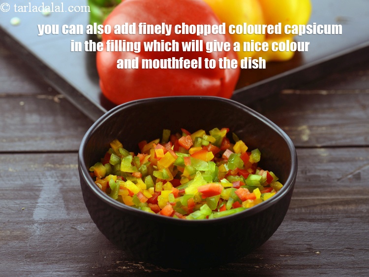 स्टेप 26 – आप भरावन में बारीक कटी हुई रंगीन शिमला मिर्च भी …