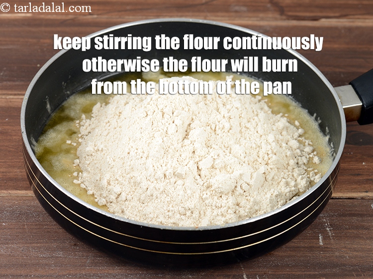 Step 39 – Keep stirring the flour continuously otherwise the flour will burn from the bottom of the …